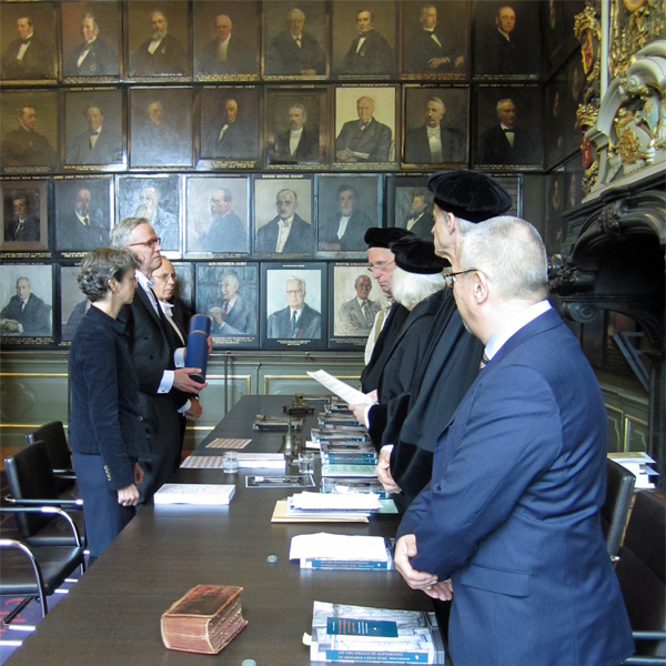 Dr. Frank E. Blokland receiving his diploma